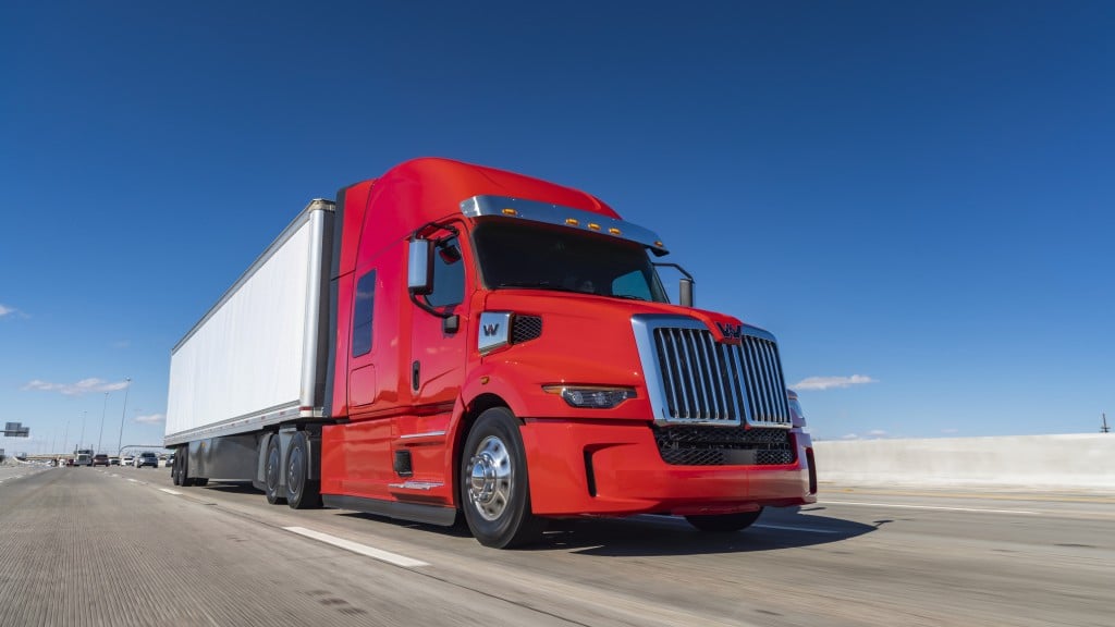 A truck drives down a road