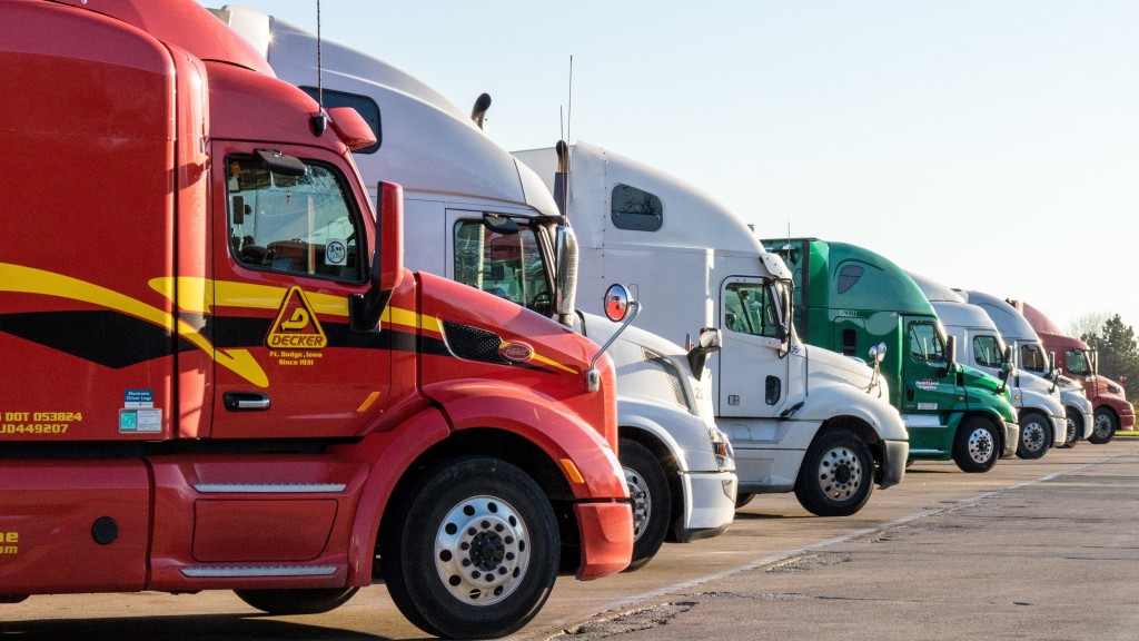 Several trucks are parked in a parking lot