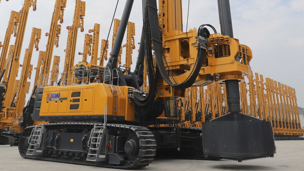 Drill rigs are parked in an assembly yard