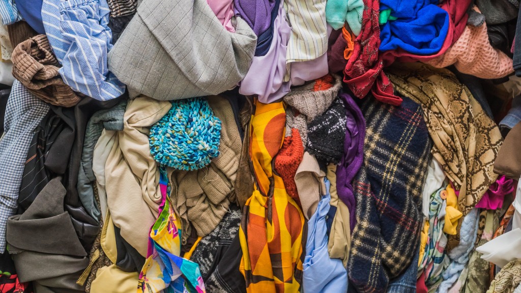 A pile of second hand clothing and textiles