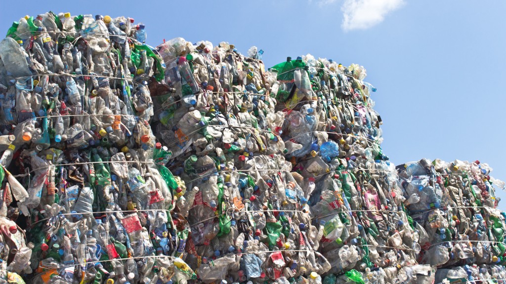Bales of plastic material are stacked in a row