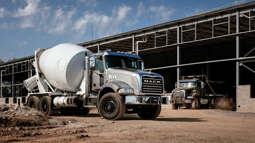 A cement truck operates on a job site