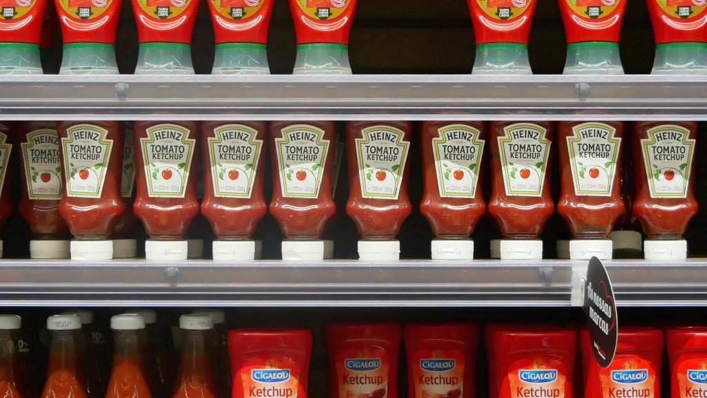 Bottles of ketchup on a grocery shelf