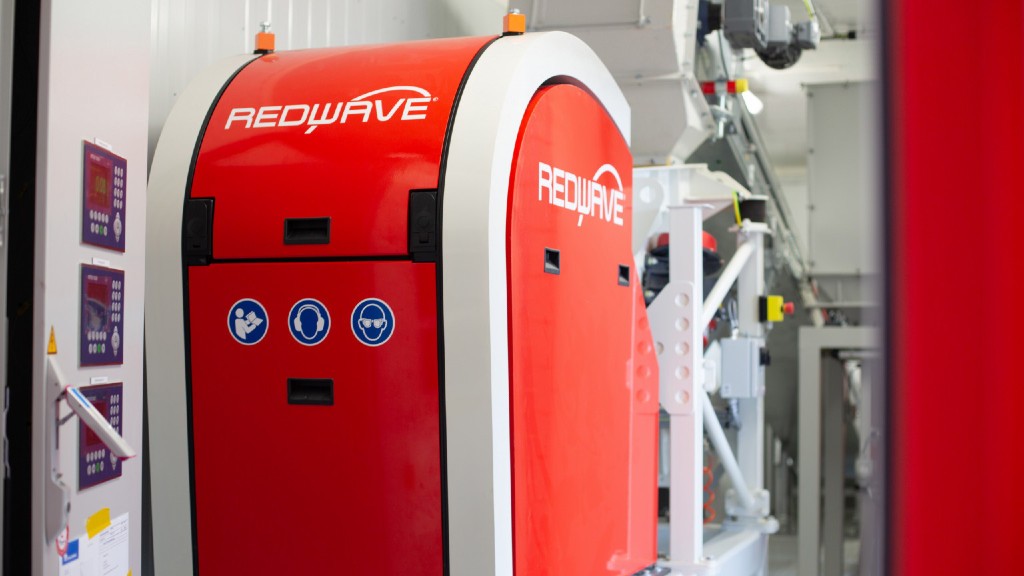 Norske Skog commissions REDWAVE material analyzer inside a shipping container to increase machine portability