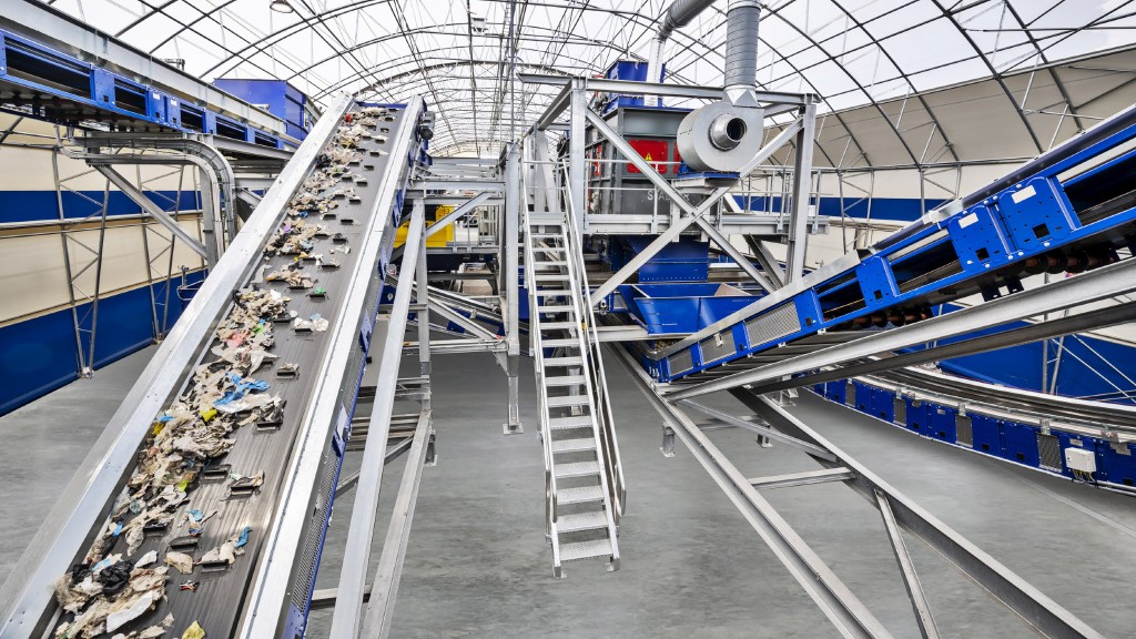 Paper moves up a conveyor in an MRF