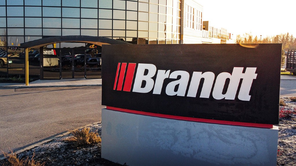 A Brandt Tractor sign outside of an office building