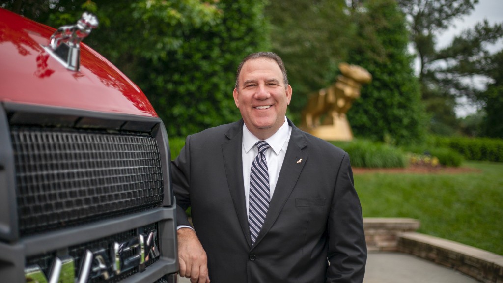 Jonathan Randall stands near a truck