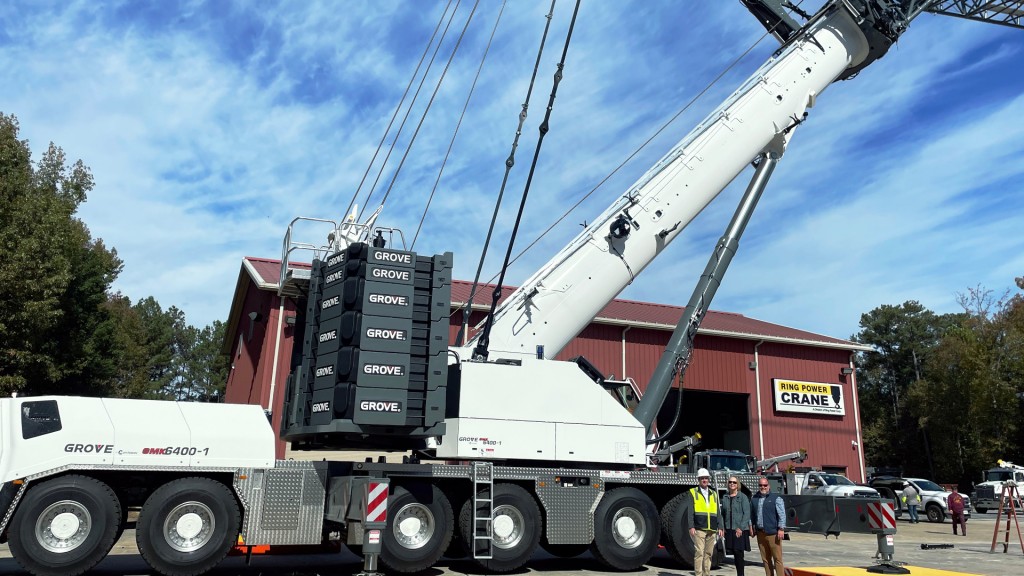 A crane in front of a building