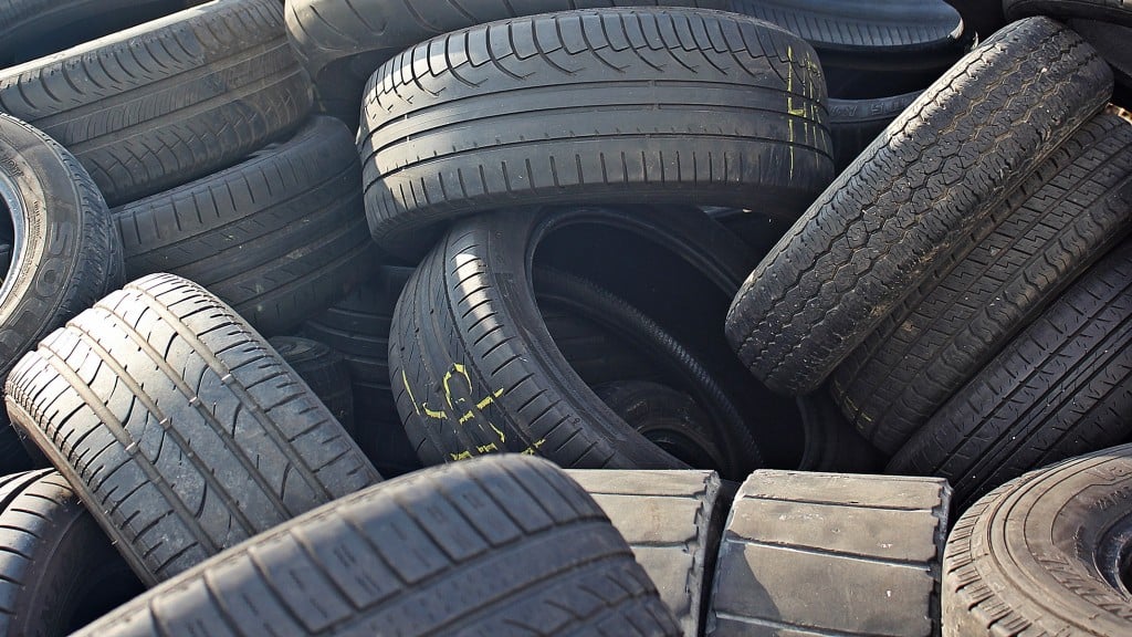 Scrap tires are stacked in a pile