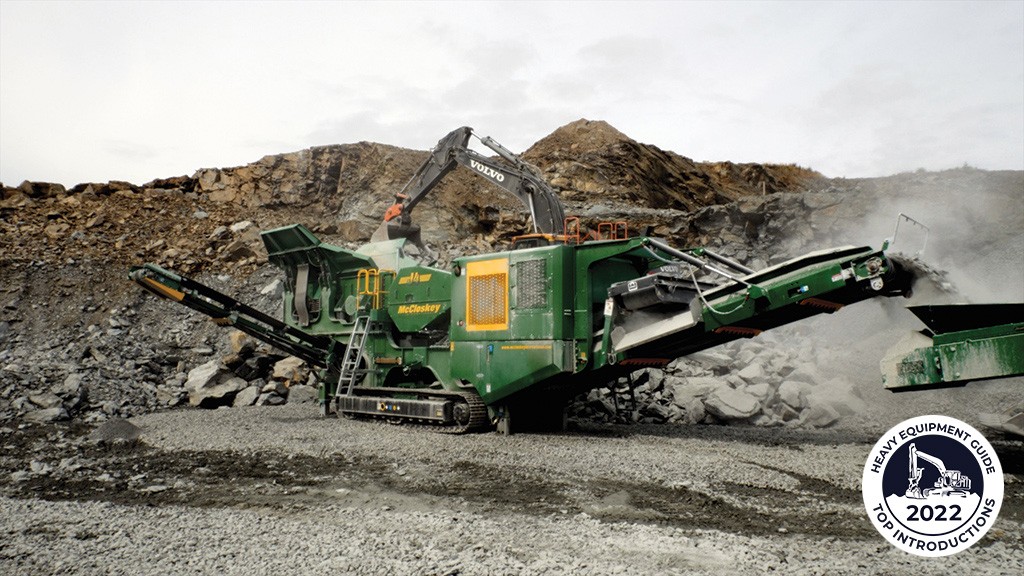 A jaw crusher crushes rock on a job site