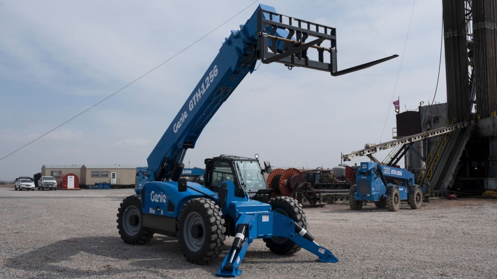 Duron Equipment Inc. - Got something high up needing some TLC? Look no  further than the Genie GTH 1056 with the Haugen Work Platform! 10,000 LBS  lift capacity and 56ft of reach.