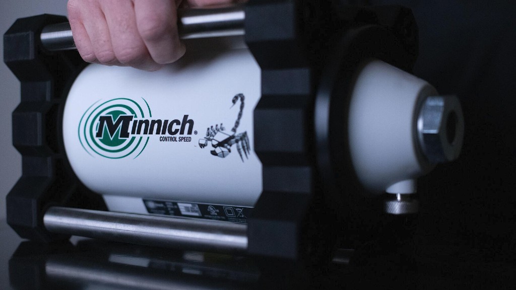 Minnich's previous logo with emanating rings which represented the ripple effect of vibrators.