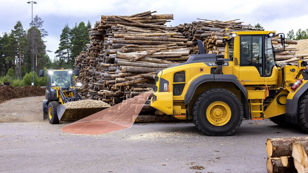 A collision sytem scans the area behind a wheel loader for risks