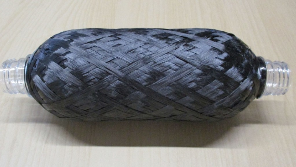 A spool of carbon fibre sits on a table