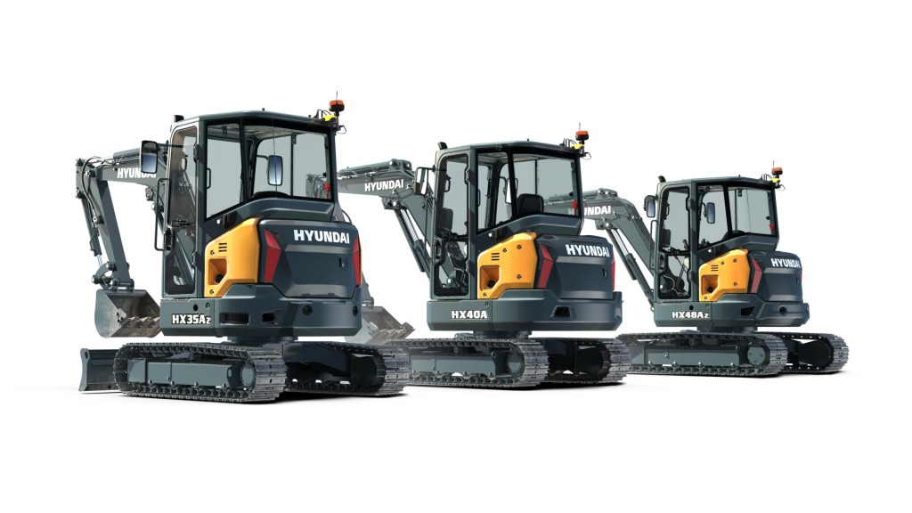 A line of three compact excavators against a white background.