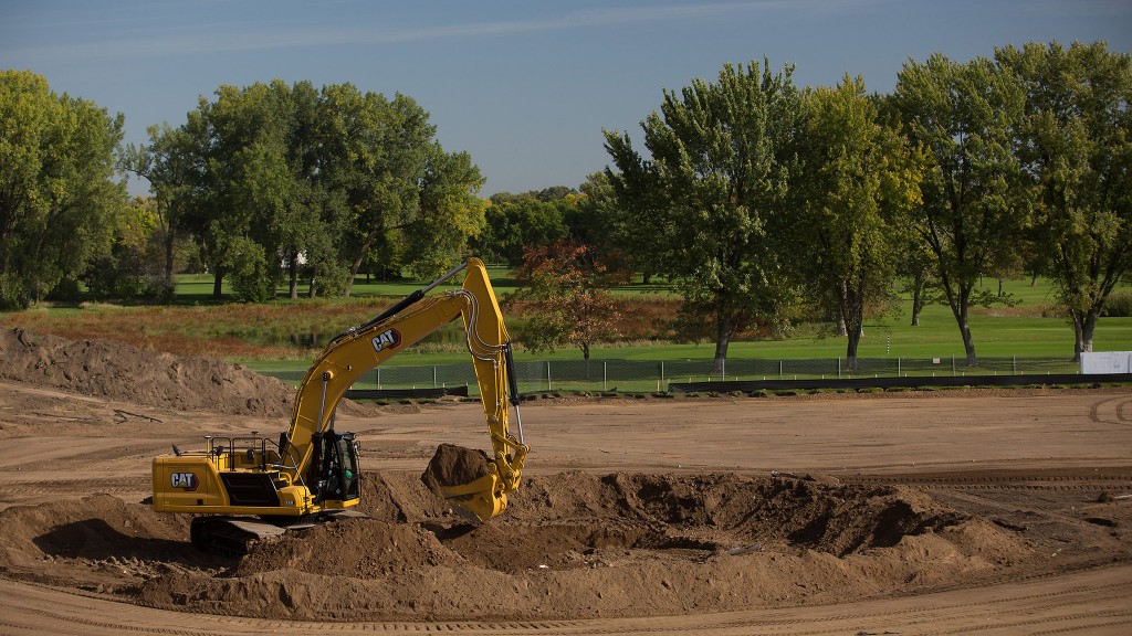 An excavator working in a circular excavation