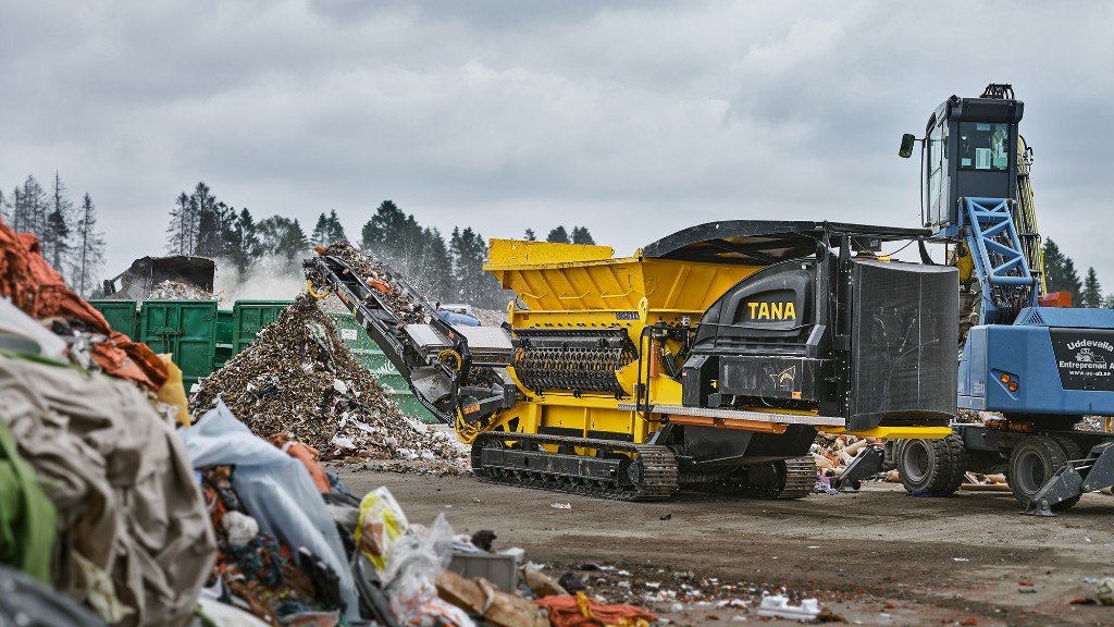 A waste shredder operates at waste management facility