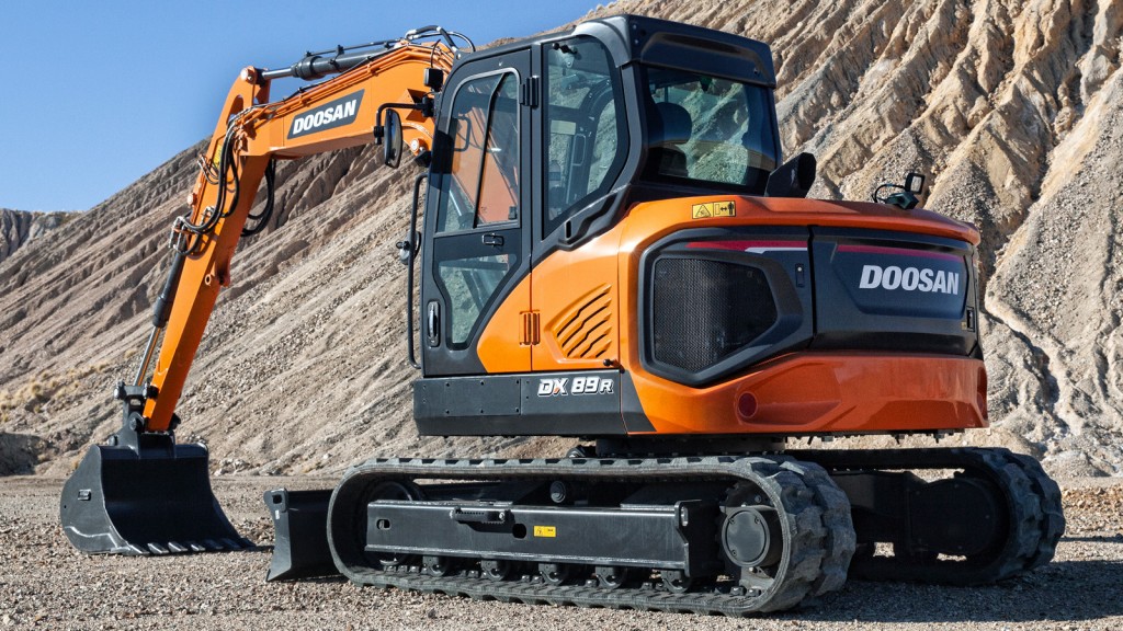 A mini excavator in a desert setting