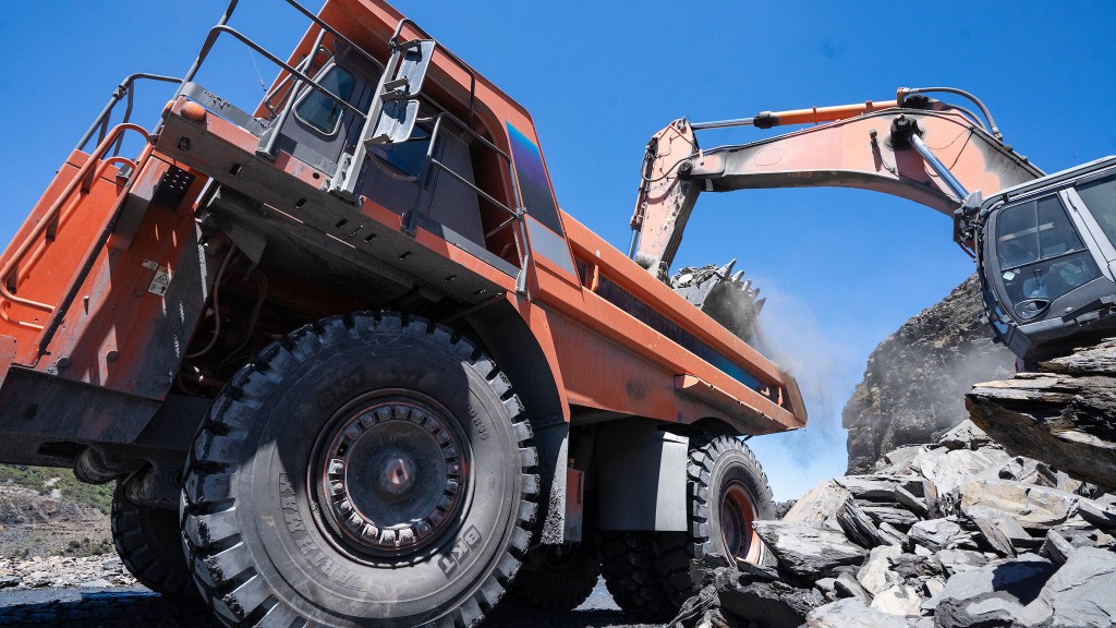 A mining truck being loaded with rock