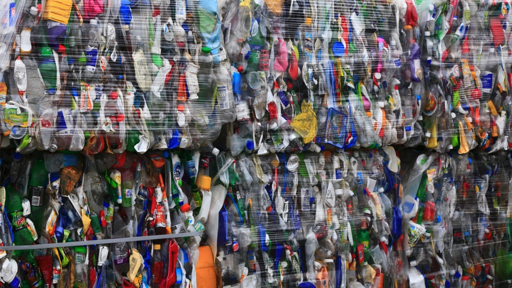 Bales of plastic bottles have been wrapped and stacked together