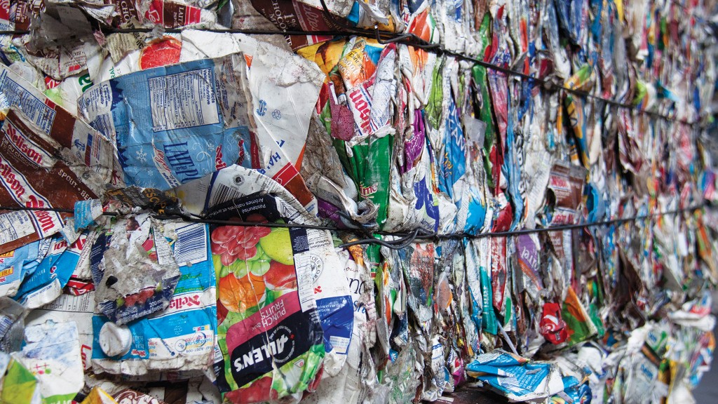 A close-up of a bale of squished cartons