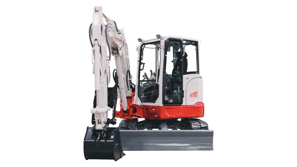 A compact excavator sits on a white background