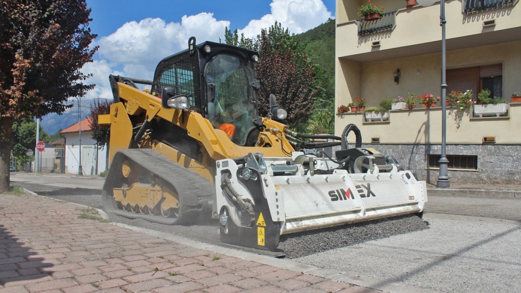 A compact track loader with a cold milling attachment.
