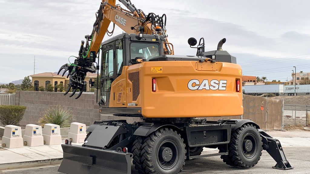 A wheeled excavator working on a work site