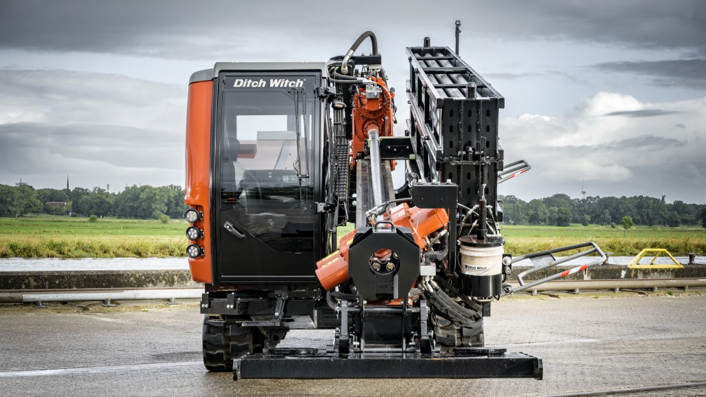 A directional drill is parked on a road
