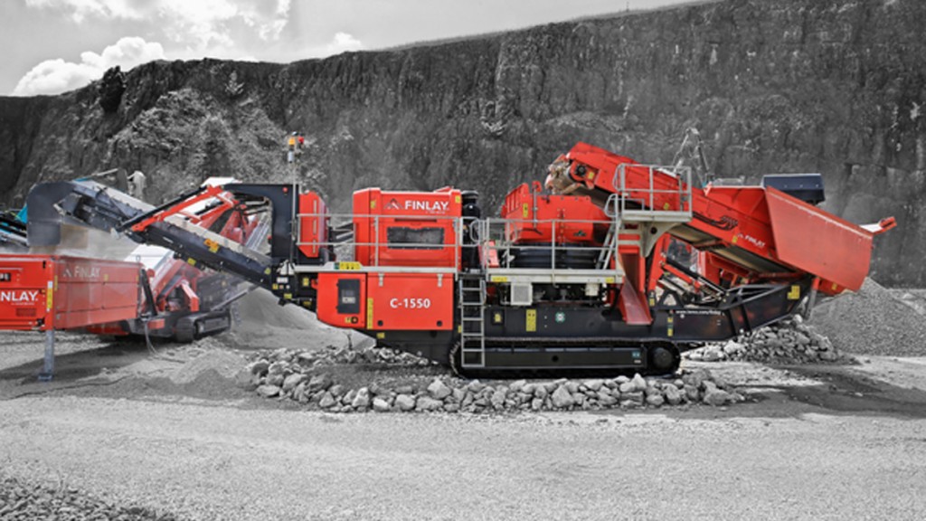 A tracked cone crusher working in a quarry.