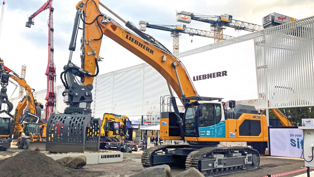 An excavator on a trade show stand.