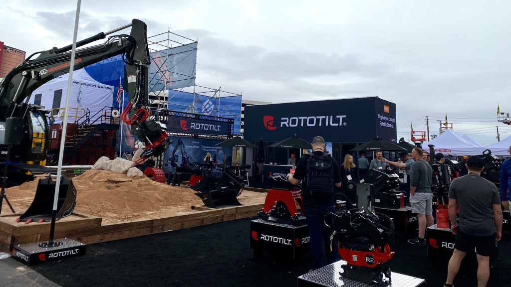 A trade show booth full of tiltrotators