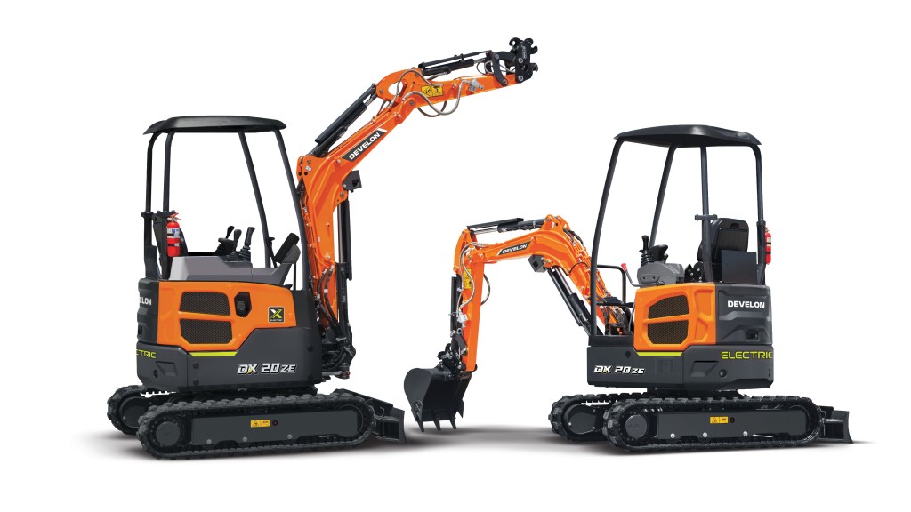 Two mini excavators are parked on a white background