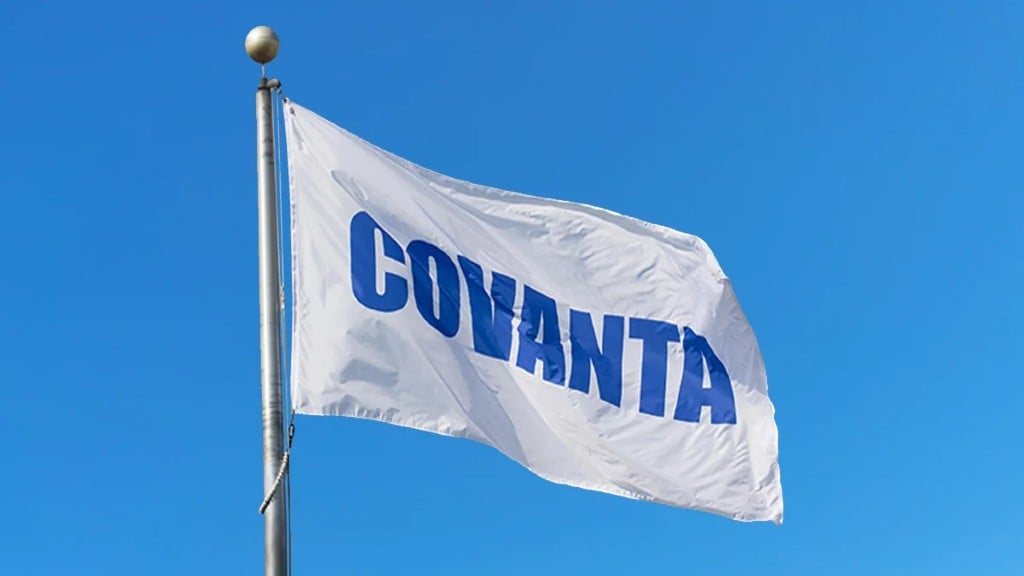 A flag with the Covanta logo flies in the sky