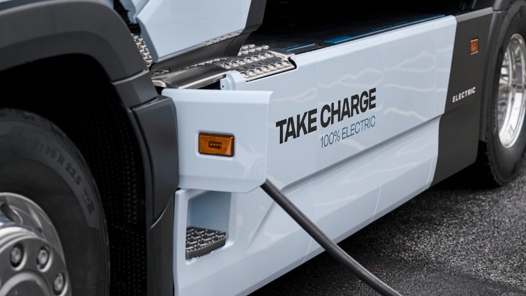 An electric truck in the middle of charging