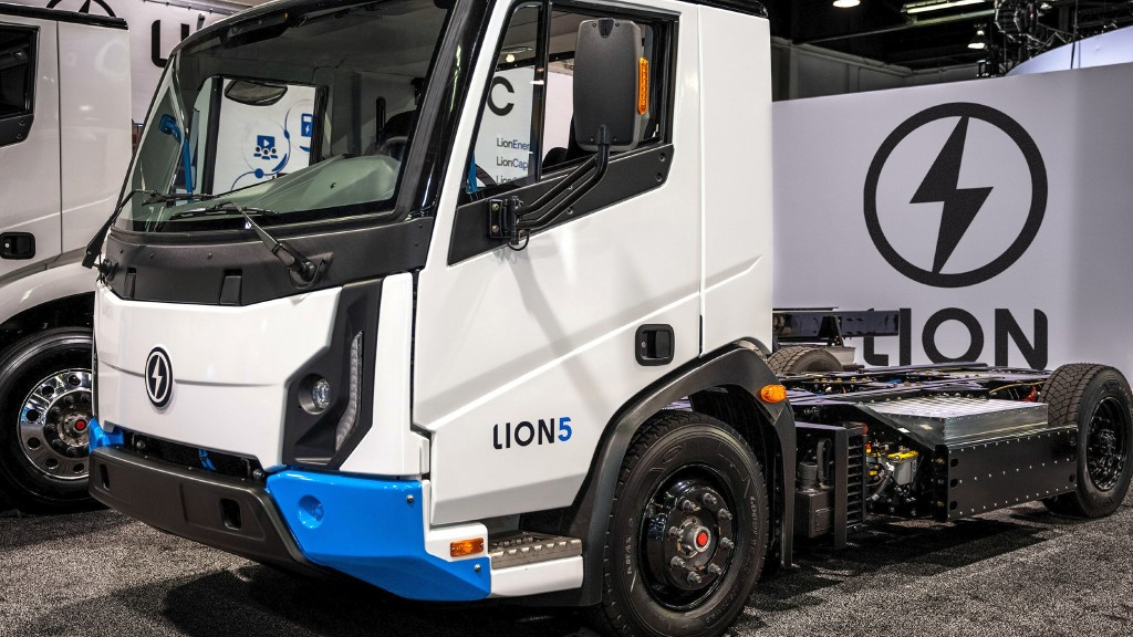 A truck is parked at a trade show display