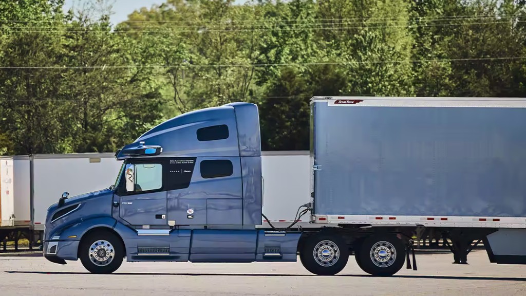 An autonomous truck inside a parking lot