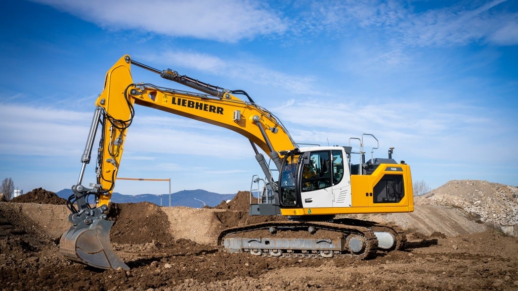 An excavator working on a dirt job site.