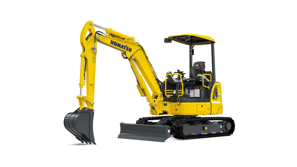 A mini excavator against a white background.