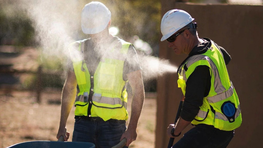 Two misting vests spray workers on a hot day