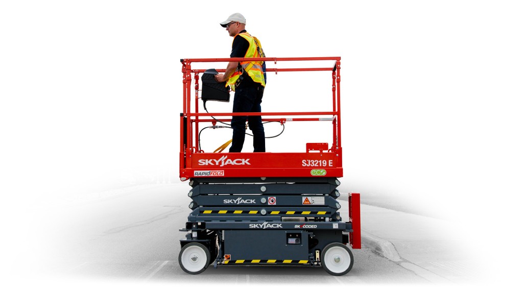 A scissor lift and operator on a white background