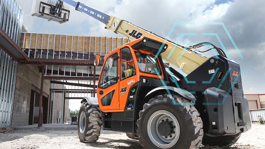 A telehandler lifts a pallet of material on a job site