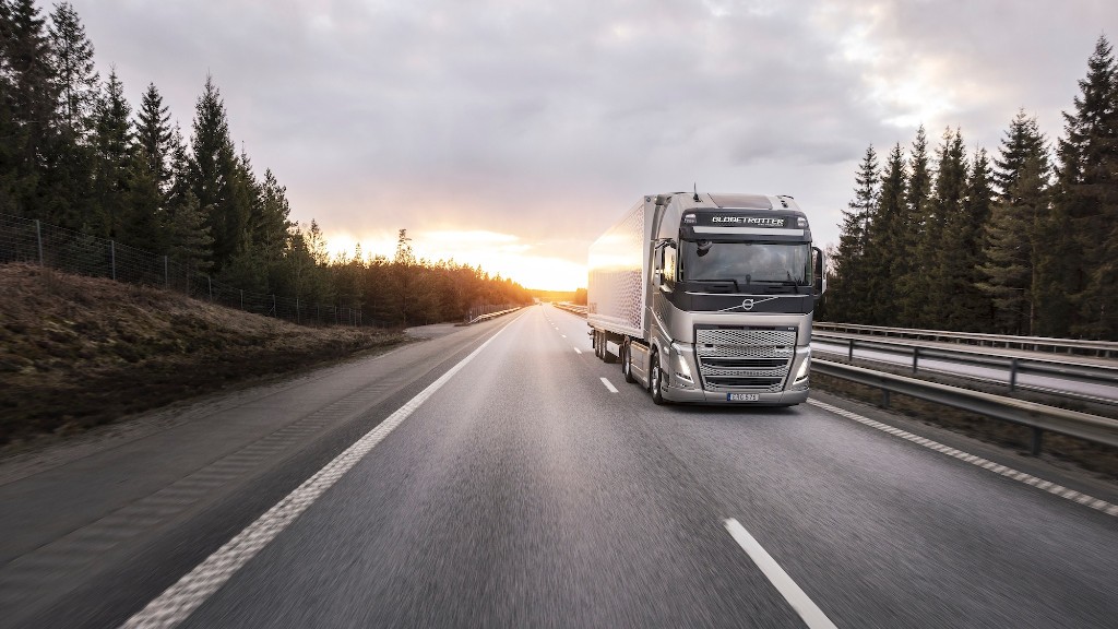 A truck drives down a highway