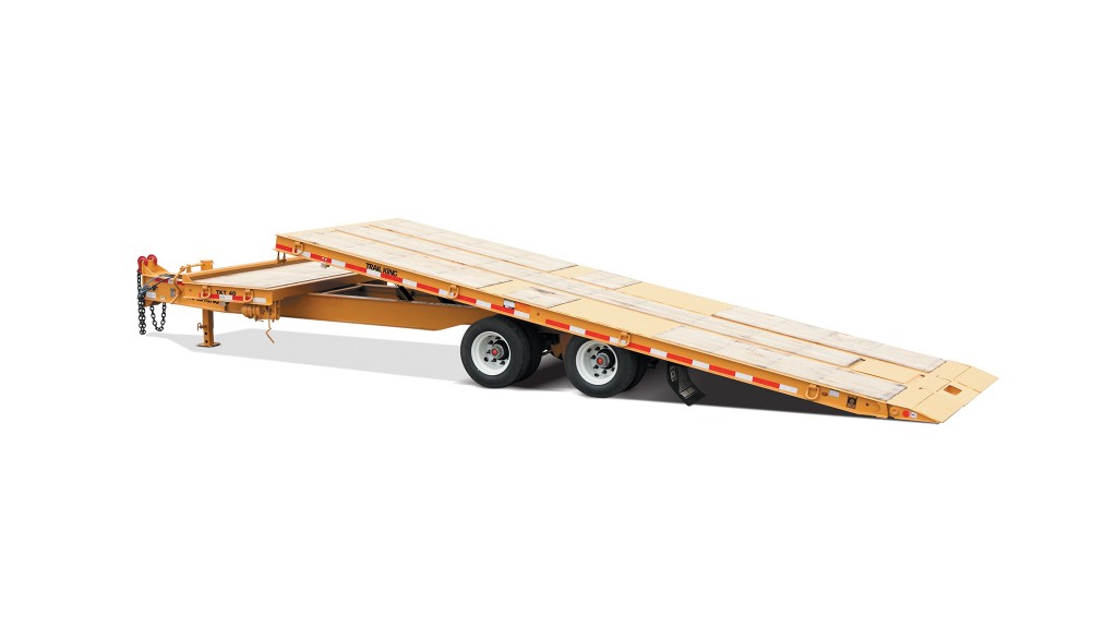 A tilting flatbed trailer against a white background.
