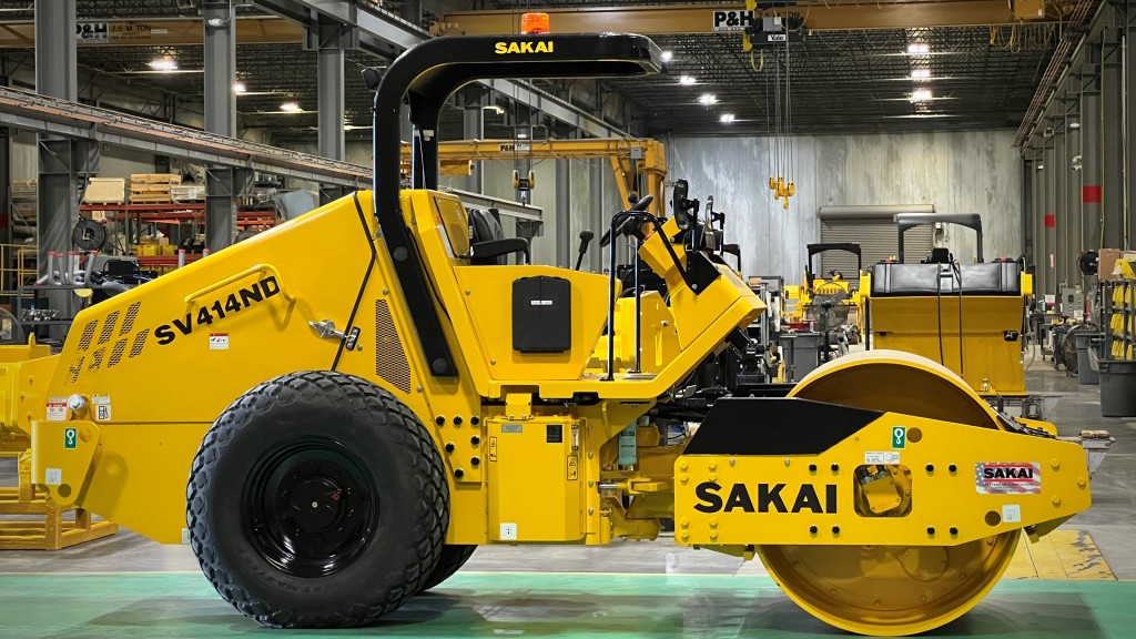 A soil compactor inside a production facility