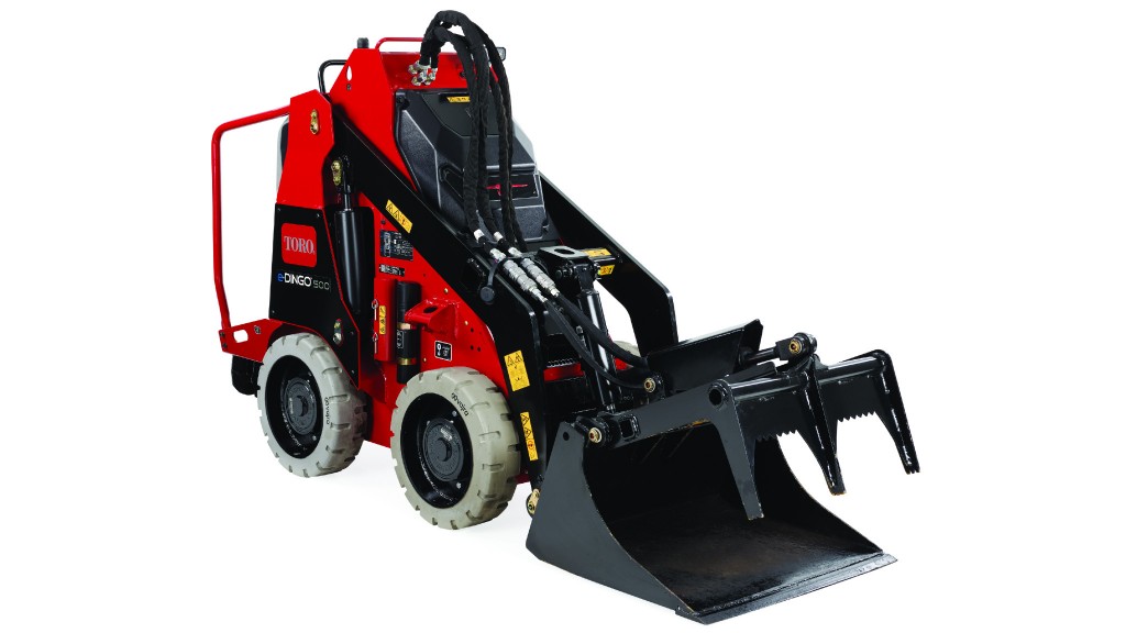 A compact utility loader and grapple bucker on a white background