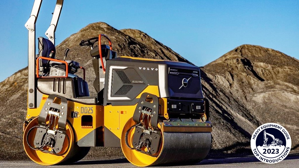 An asphalt compactor is parked at a job site