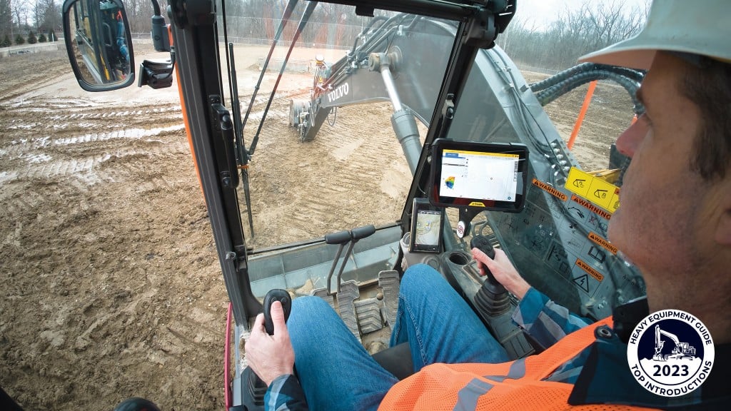 An operator utilizes machine guidance on an excavator