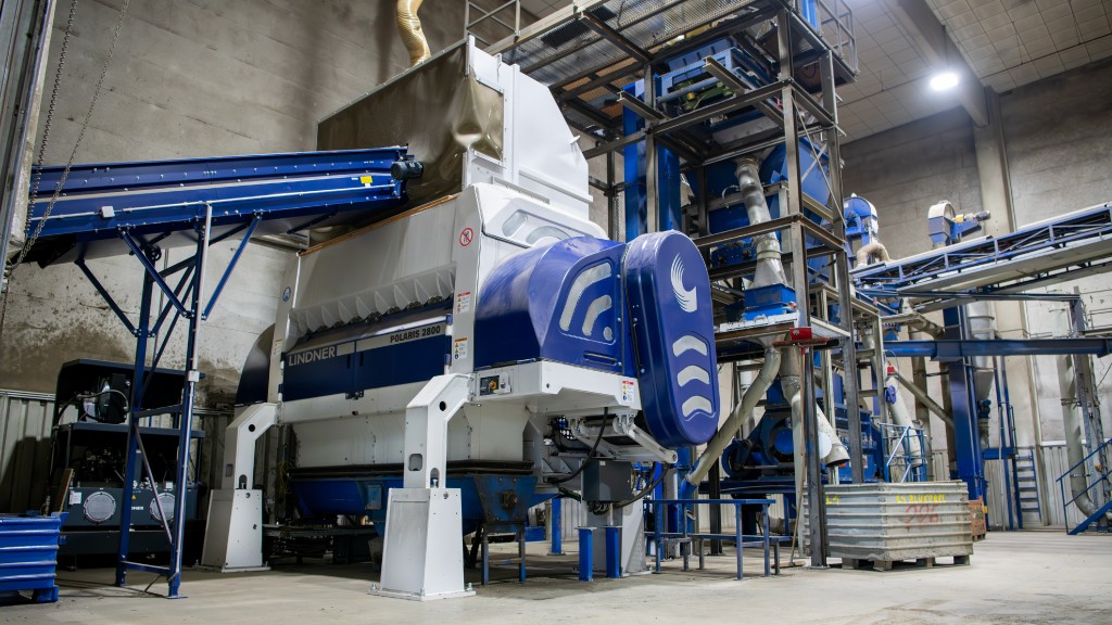 A single-shaft shredder inside a recycling facility