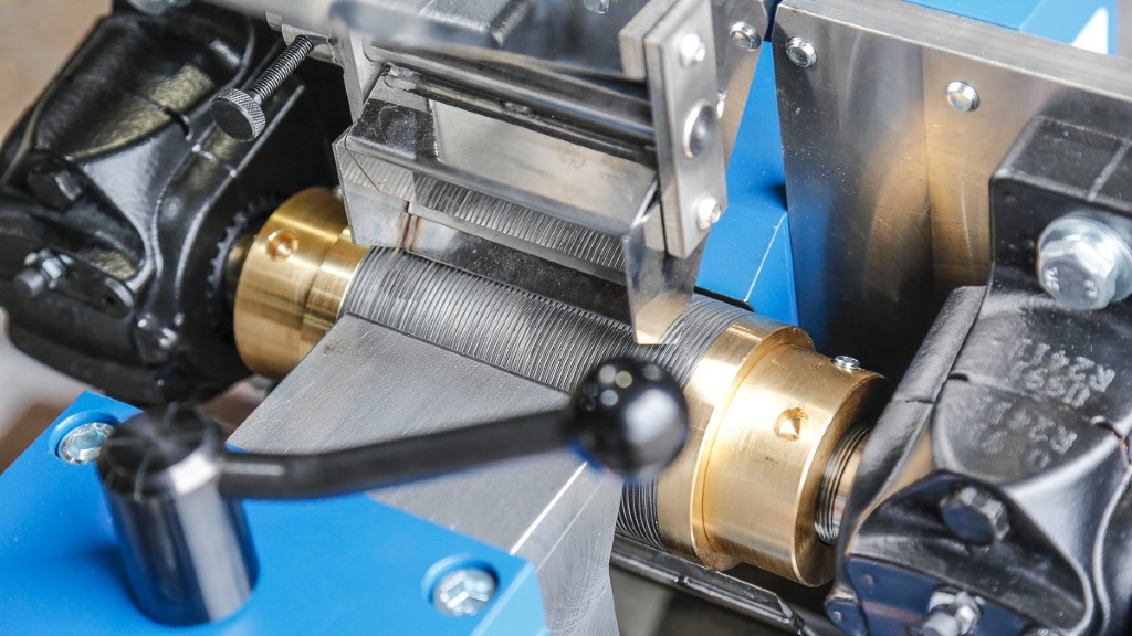 A closeup of an induced roll magnetic separator